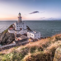 ‘Sunrise in Bailey lighthouse Dublin’ by Giuseppe Milo is licensed under CC BY 2.0.