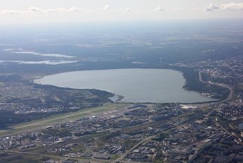 Aerial view of Tallinn with buildings and a large lake