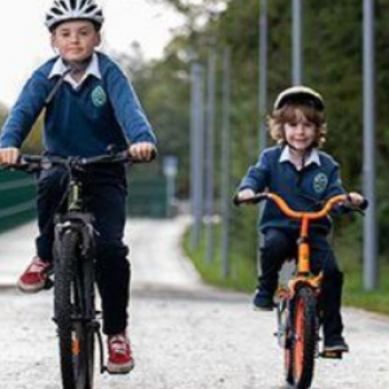 Two children cycling